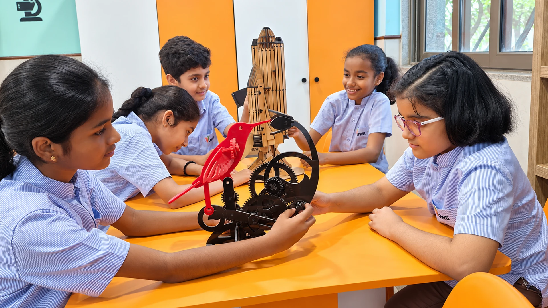 Ujjval students exploring an engineering model