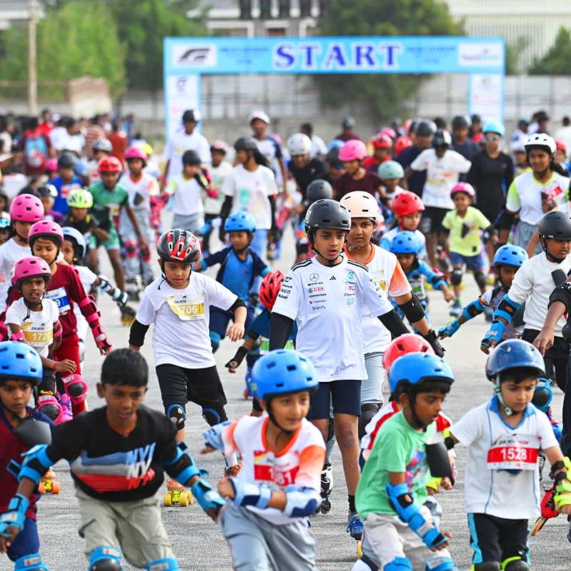 Young skaters participating in a large outdoor event